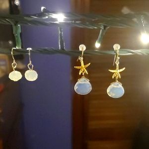 Cloudy colored earrings, one pair has gold starfish